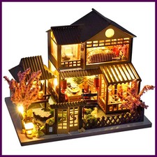 Mini casa delle bambole in